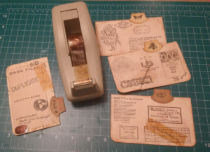 Distressed tape fixing a deliberate rip