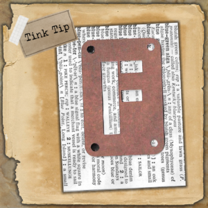 Black Sharpie used to fill small holes in stencil letter for junk journal embellishment